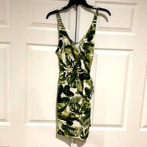 Leaf print side tie wrap mini dress.